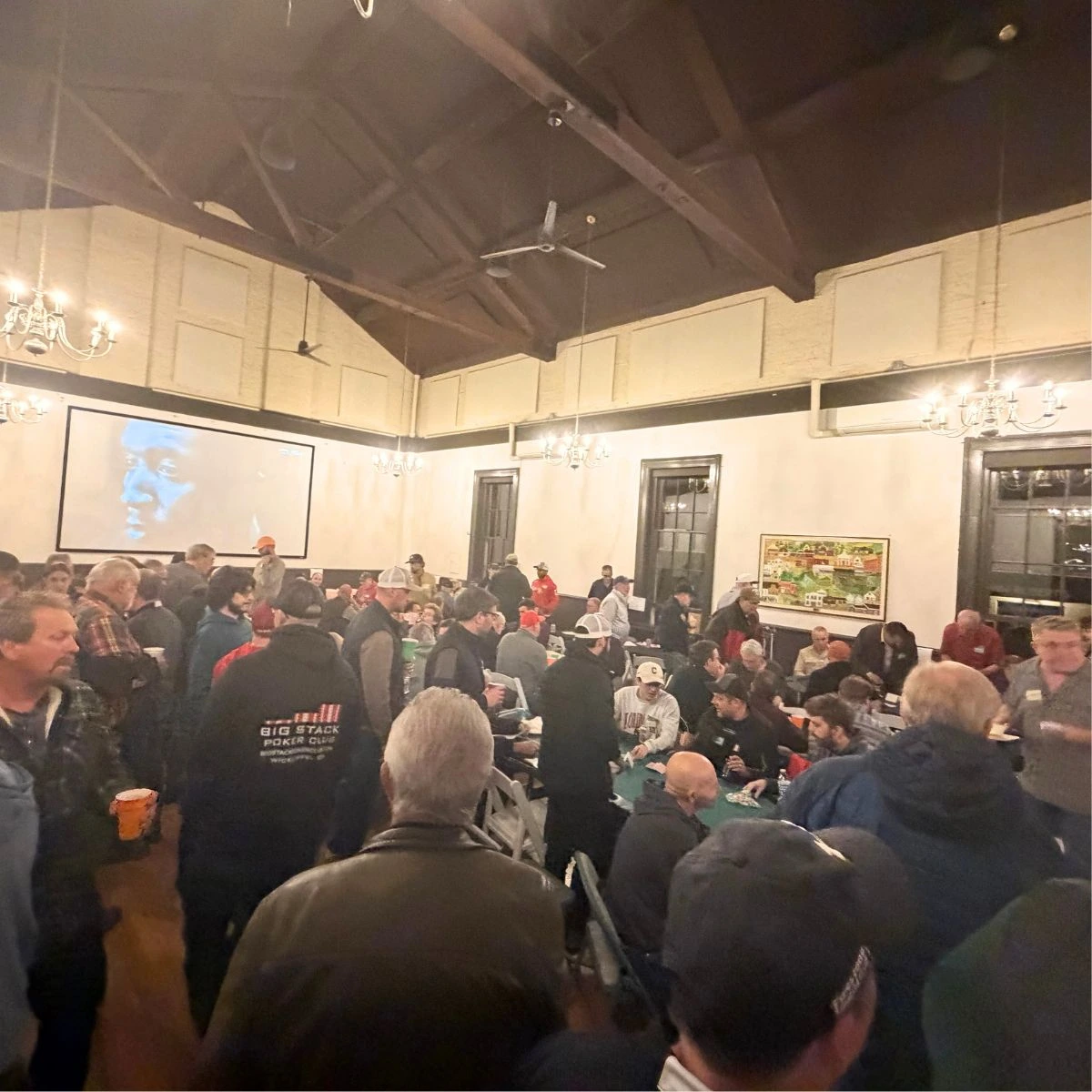 CFDC Texas Hold'em charity tournament — card action at Chagrin Falls Township Hall